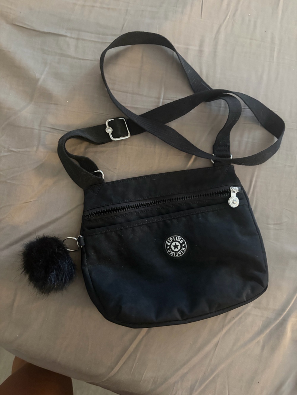 Kipling Black Sling Crossbody with Pom Pom Charm